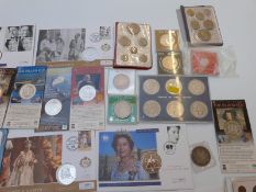 A collection of modern commemorative crowns, coin first day covers etc, includes 1935 'rocking
