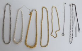 Three silver gilt necklaces and four silver necklaces etc