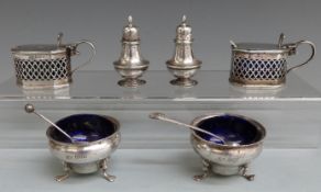 Pair of hallmarked silver mustards with blue glass liners, pair of hallmarked silver open salts with