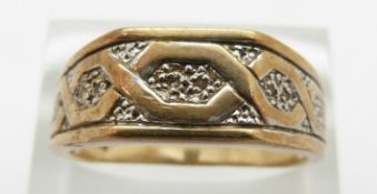 A 9ct gold ring set with diamonds in a Celtic design, 4.6g, size S
