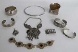 Five bracelets including a Chinese example decorated with fish, white metal necklace etc