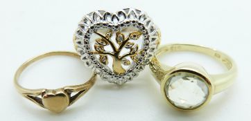 Two silver rings and a 9ct gold ring, 0.9g, size J