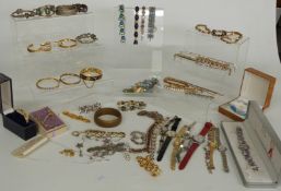 A collection of costume jewellery including bangles, Coro bracelet, watches, Marcel Drucker watch,