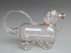 Elkington & Co. Ltd Edward VII hallmarked silver mounted novelty glass decanter formed as a dog,