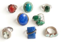 Eight silver rings marked 925 set with malachite, azurite, lapis lazuli and aquamarine