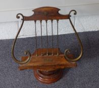 19thC brass and walnut or similar lyre shaped music stand, height 51cm