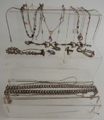 A collection of silver jewellery including necklaces, bracelets, etc