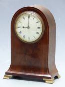 French late Victorian mantel clock in inlaid flame mahogany arch topped case with flared base,