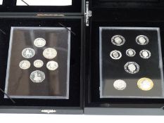 Royal Mint 2008 and 2015 UK silver proof coin sets, both in deluxe cases with certificates