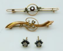 A 9ct gold brooch set with seed pearls in a clover design (Chester 1915), a 9ct gold brooch set with