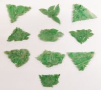 Ten small jade carvings depicting various symbols