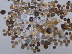 An amateur collection of overseas coinage, early 20thC onwards, in metal cash box