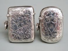 Two hallmarked silver vesta cases, both with engraved foliate decoration, one Birmingham 1908 the