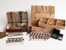 A collection of costume jewellery including necklaces, silver marcasite brooch, enamel brooches,