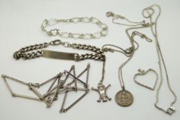 A collection of silver including a pendant, identity bracelet and necklaces including bespoke silver
