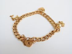 A 9ct gold charm bracelet, 12.1g
