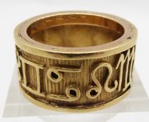 An 18ct gold/yellow metal ring, 13.7g, size P