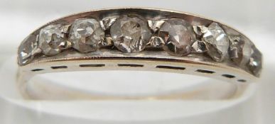 An 18ct white gold ring set with eight diamonds, 2.3g, size N