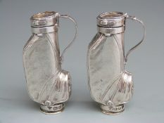 Pair of Garrard modern novelty hallmarked silver salt and pepper formed as golf bags, London 1991,