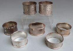 Seven various hallmarked silver napkin rings, weight 122g