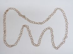 A 9ct gold necklace made up of square and circular links, 10.9g