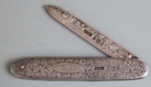 George V hallmarked silver folding knife with engraved decoration to body and blade and two