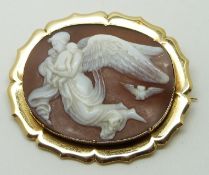Victorian gold brooch set with an unusual scene of an angel and cherubs, 4.3 x 3.3cm