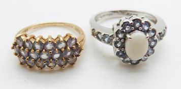 A 9ct white gold ring set with an opal and sapphires, 5.7g, size T and a 9ct gold ring set with