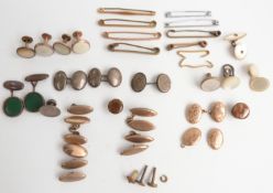 A 9ct gold brooch (0.6g), a yellow metal brooch, a pair of yellow metal cufflinks (3.4g) , silver