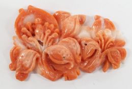 A piece of carved coral depicting lilies, 4.5 x 3cm