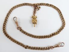 A 9ct gold watch chain/ Albert with a 15ct gold pixie charm, 14g, 36cm long