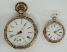 Two continental white metal keyless winding open faced pocket watches both with white enamel