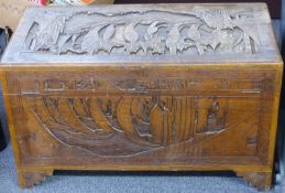 A carved oriental camphorwood trunk, W100 x D50 x H57cm
