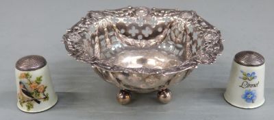 Victorian hallmarked silver pierced and embossed bonbon dish raised on four ball feet, Birmingham
