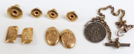 A 9ct gold cuff link (1.9g), four 18ct gold studs, a 9ct gold cuff link, and silver coin fob