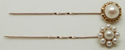 Two 9ct gold stick pins set with pearls, 2.8g