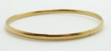 An 18ct gold bangle, 6.6g, 5.9 x 6cm
