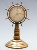 20thC Oris eight day brass novelty clock in the form of a ship's wheel, 20cm tall