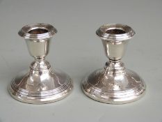 A pair of hallmarked silver squat candlesticks, Birmingham 1923, height 6cm