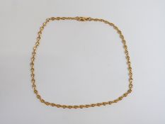 A yellow metal necklace marked 333, 20.5cm drop, 11.0g