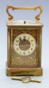 Late 19th/early 20thC brass carriage clock with half hourly repeater mechanism, Arabic ivory