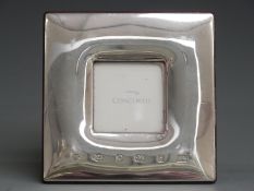 Concorde hallmarked silver photo frame with easel back by Corrs, overall size 12 x 12cm