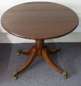 Mahogany circular table raised on four legs, diameter 80cm, height 74cm