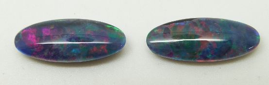 Two black opal triplets and a oval opal cabochon