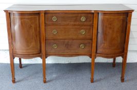 Late 19th/early 20thC sideboard having three drawers flanked by cupboard, raised on square