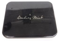 Danbury Mint tin containing almost 200 uncirculated USA quarter cent coins in capsules, most with