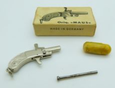 Original Maus German miniature percussion pistol,  length 4.5cm, in original box