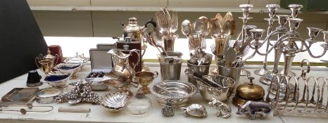 Collection of silver plated ware including pair of candelabra, six-division toast rack, set of three