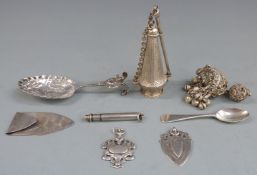 Hallmarked silver money clip, a white metal spoon, two hallmarked silver fobs, an S.Mordan & Co