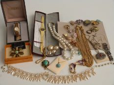 A collection of jewellery including brooches, Jewel Craft earrings, watches, a 9ct gold back and